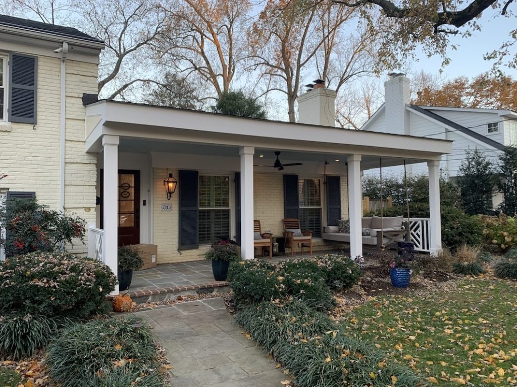 A custom front porch after the addition process