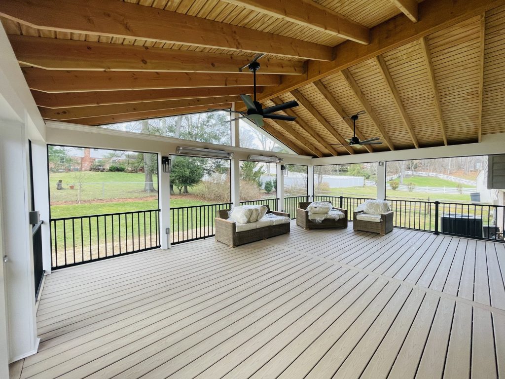 Screened in porch with a view of the yard. 